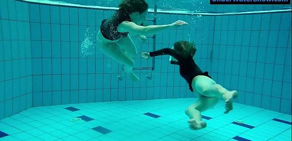  Two hot teens underwater
